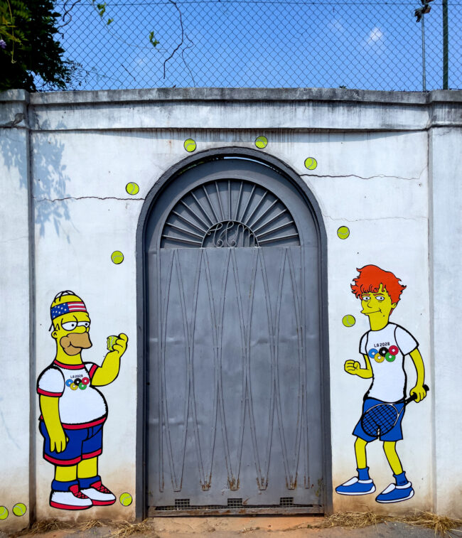 Jannik Sinner and Homer Simpson The Simpsons Los Angeles 2028 The Olympic Games Street art Olimpiadi Tennis Club Milano Alberto Bonacossa Trofeo Bonfiglio murales artist aleXsandro Palombo