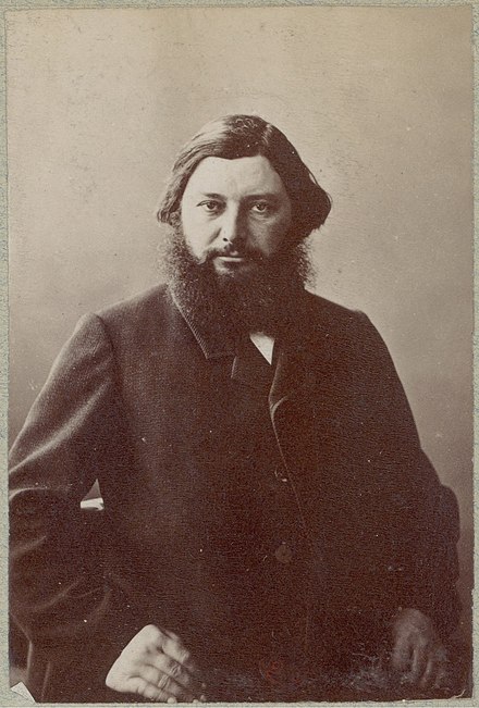 440px-Gustave_Courbet,_photograph_Atelier_Nadar,_c._1860s Courbet fotografato da Nadar nel 1860 circa