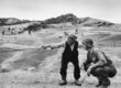A-sicilian-peasant-telling-an-American-officer-which-way-the-Germans-had-gone-near-Troina-Italy-August-1943.-Robert-Capa_International-Center-of-Photography_Magnum-Photos